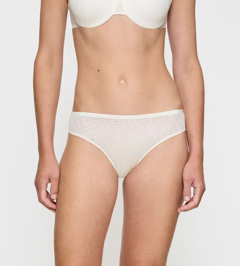 Triumph – Transparenter Damenslip „Signature Sheer Tai Brief“ in Ecru-Weiß